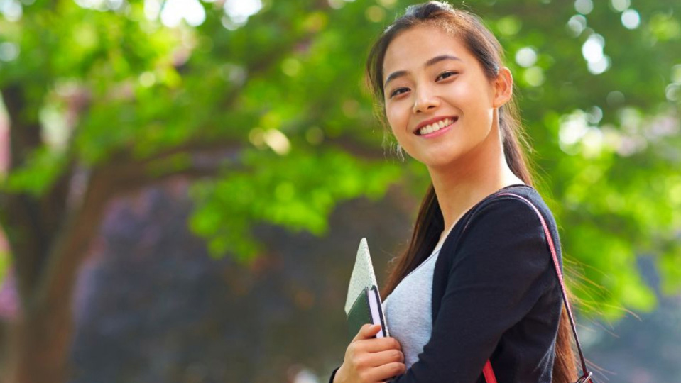 happy teacher that successfully used AI grader with students